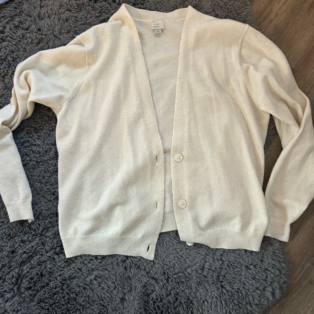 cream open sweater